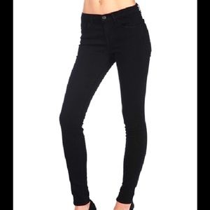 J Brand Black Mid Rise Skinny Jeans.